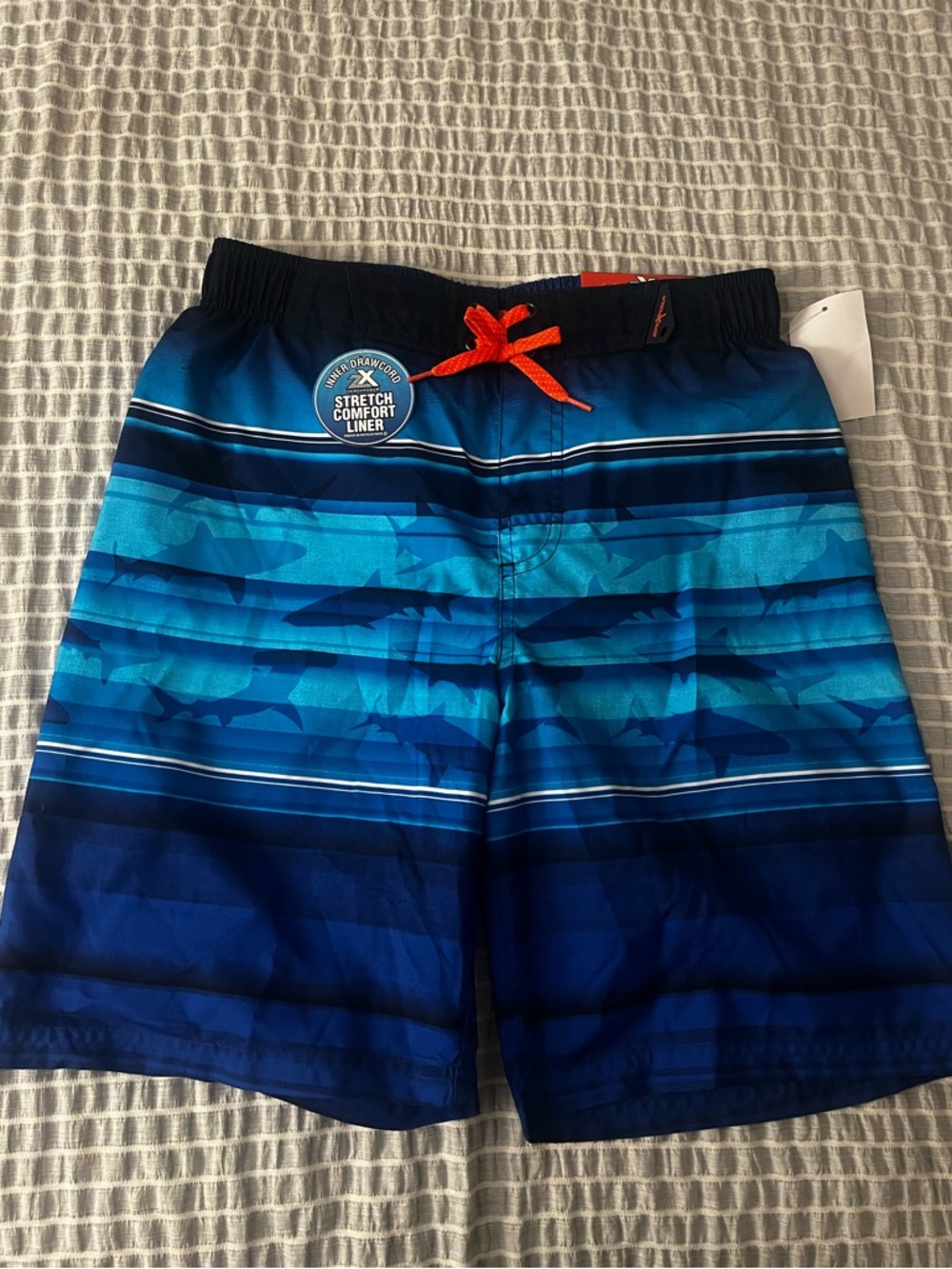 ZeroXposur Blue Ombre Shark Stripe Swim Trunks with Orange Drawstring